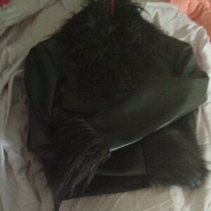 Sleek Black Leather Jacket with Textured Sheen